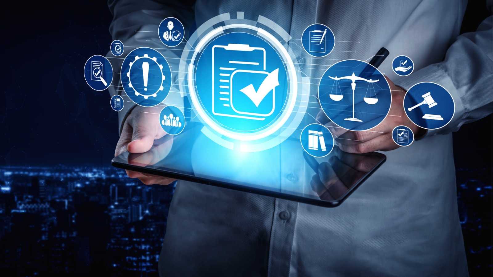 A person holding a tablet with brightly lit icons representing law, trust, compliance